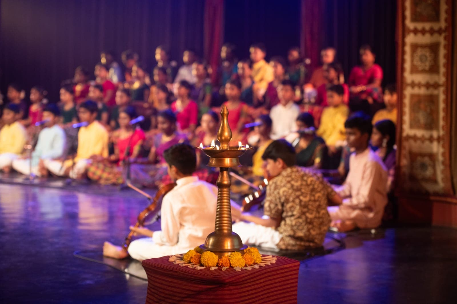 Students performing on stage during a cultural programme